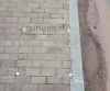 Фото с объекта люки под брусчатку Drago на тротуаре